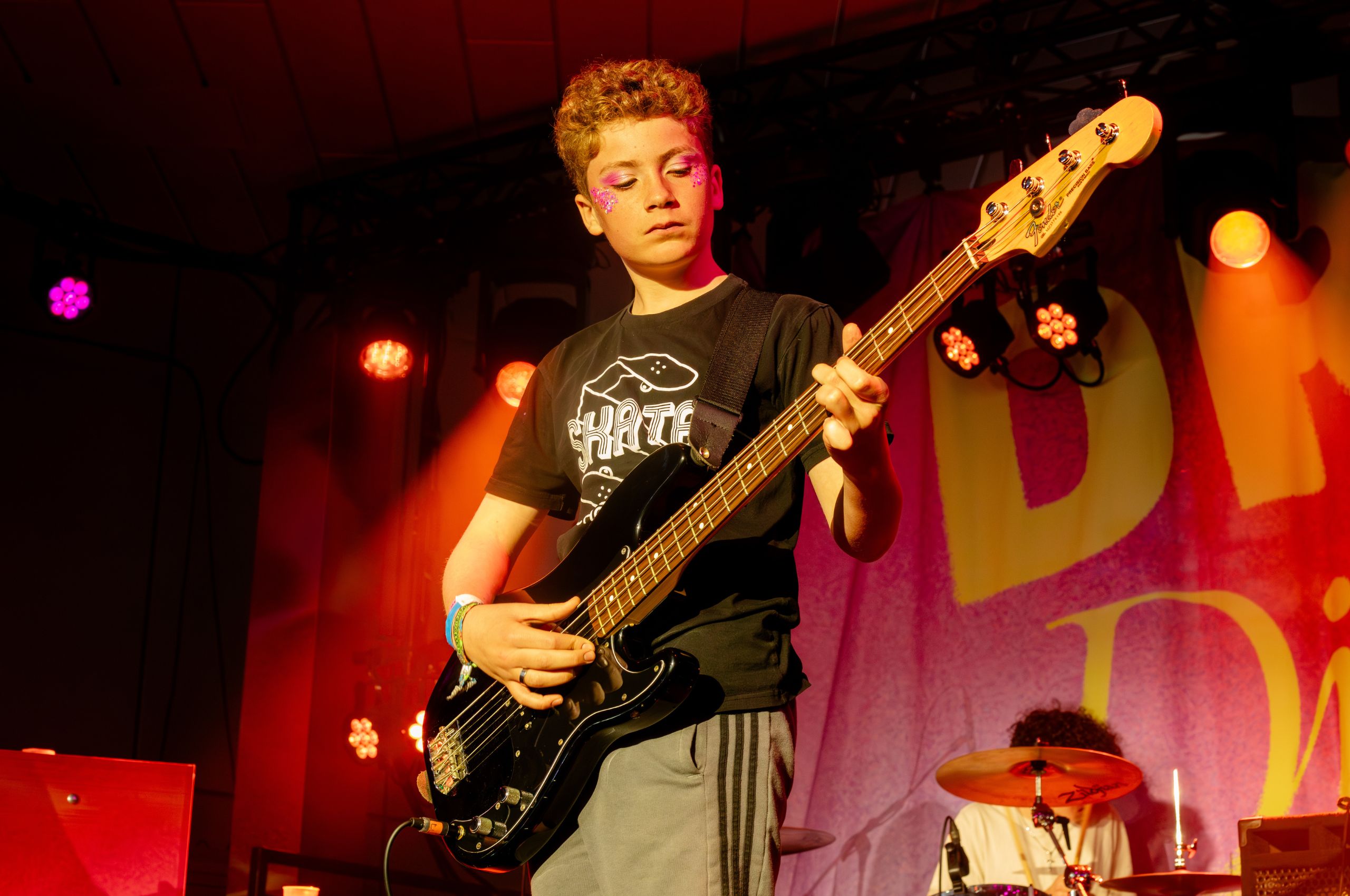 Child playing the guitar